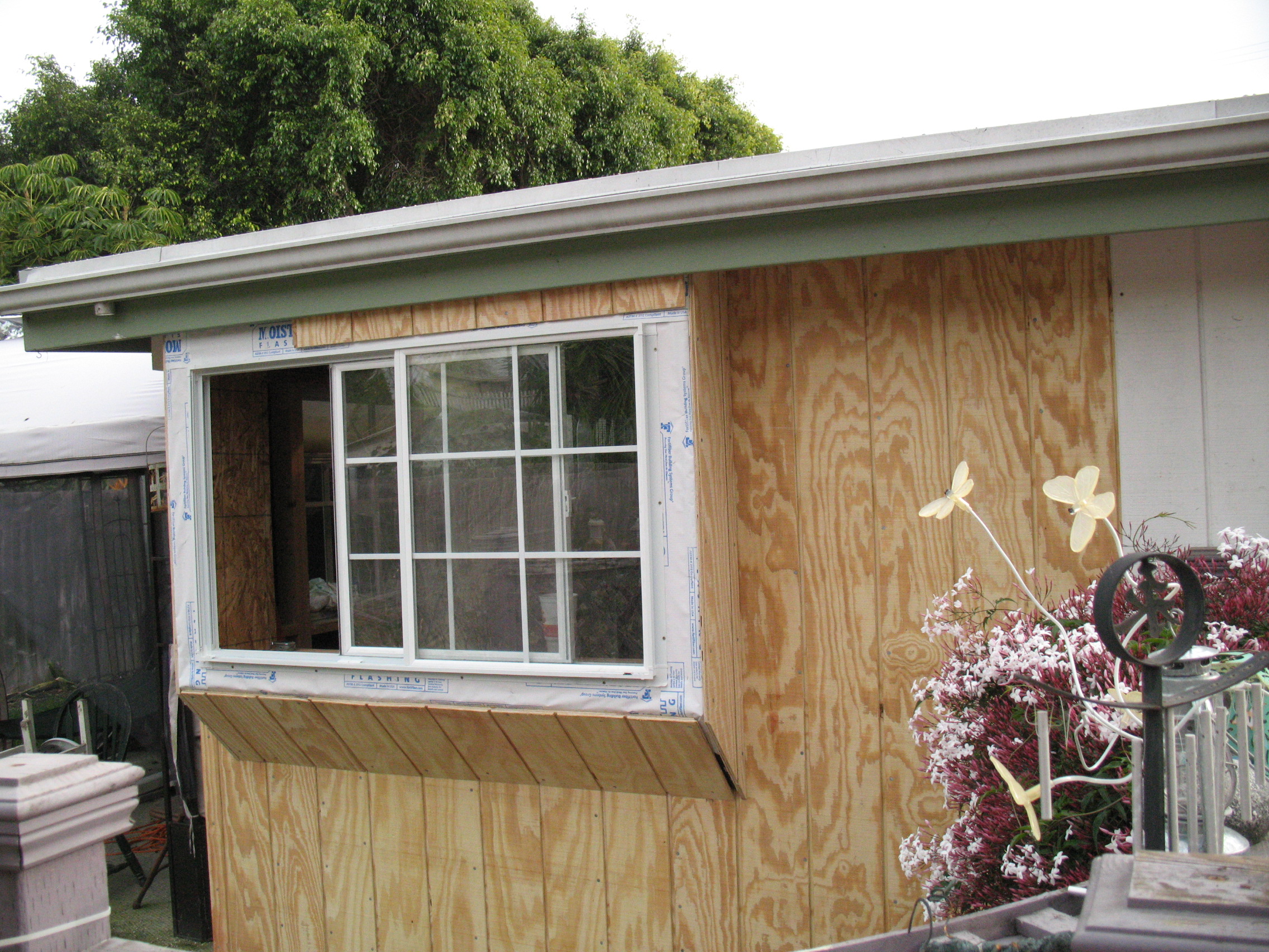 Finishing Pop Out Window Installation